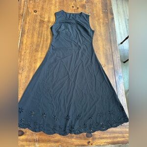 Sleeveless Black Maxi Skirt with Laser-Cut Floral Hem